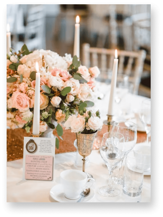 Wedding table setting with flowers and candles